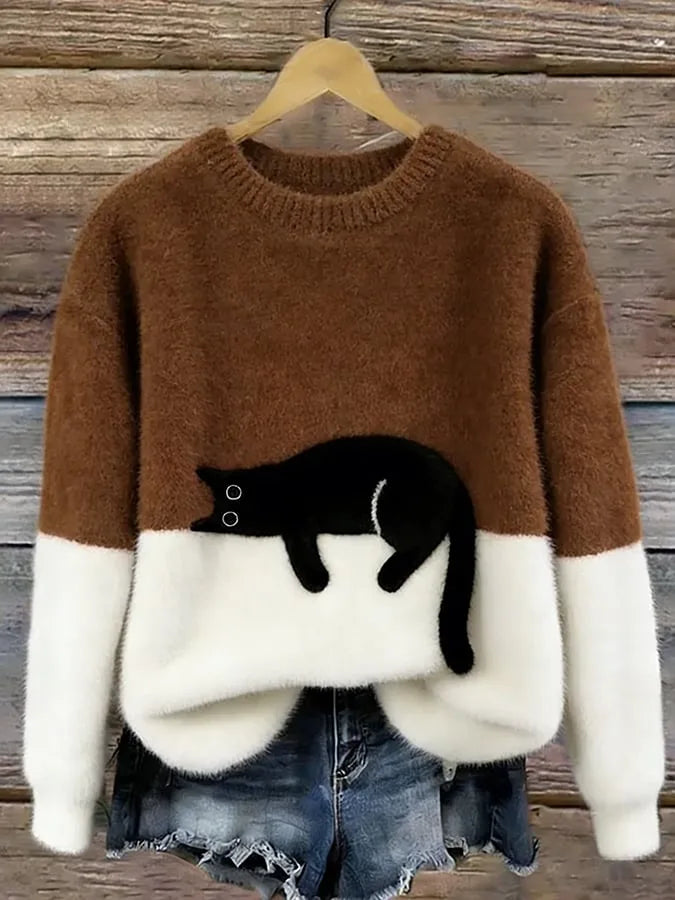 Colour-block fuzzy jumper styled with distressed denim shorts, showing the relaxed drop-shoulder fit