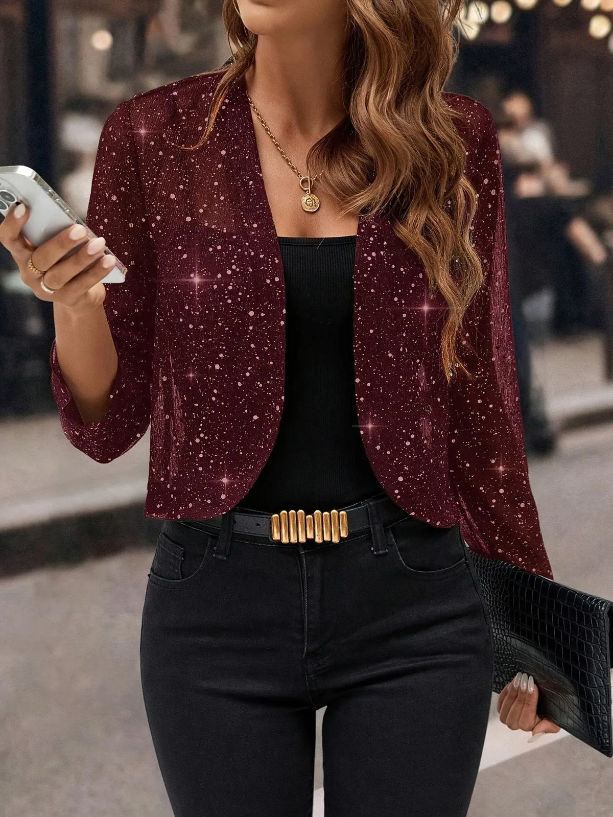 Burgundy glitter sequin open cardigan jacket shown with long sleeves and a relaxed cropped fit