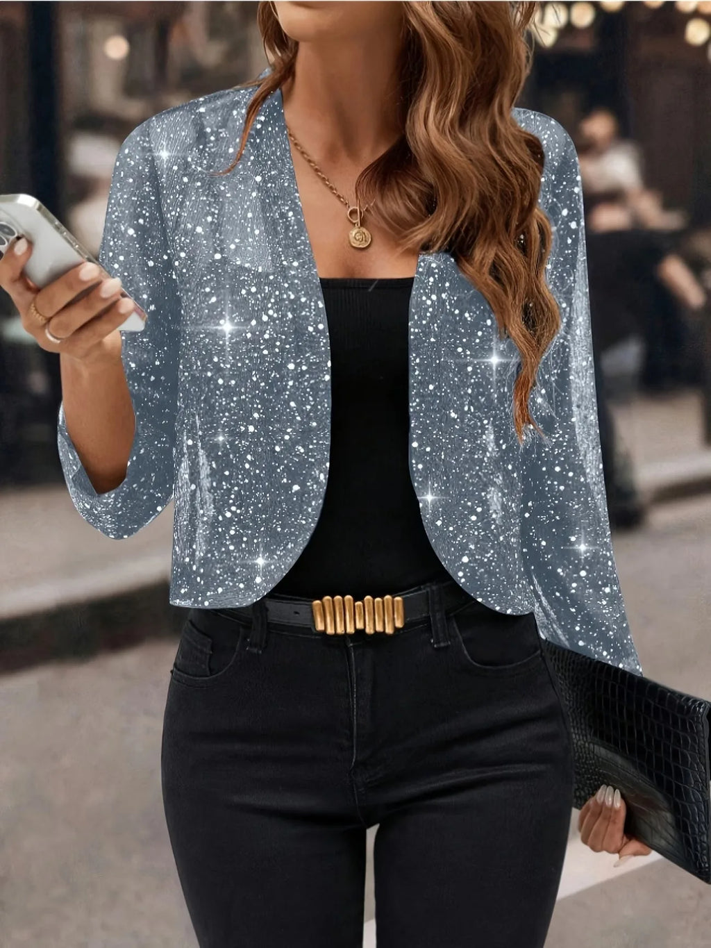 Grey sparkly sequin cropped cardigan jacket with sheer glittery fabric worn open, front view