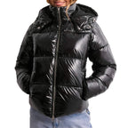 Close-up of the black glossy puffer jacket showing the adjustable hood, silver zip pull and fleece-lined collar
