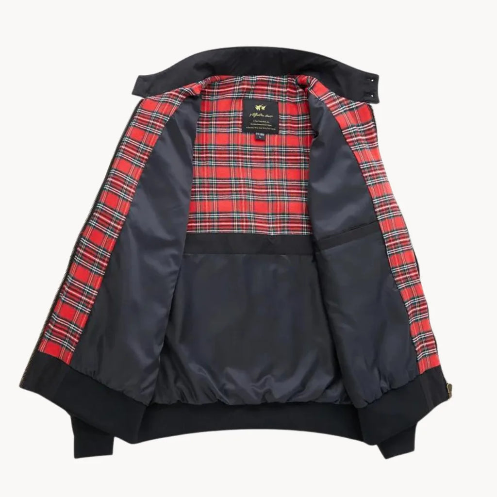 Black Harrington jacket laid open from the back view, revealing full red tartan interior lining