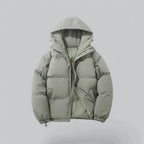 Sage green hooded puffer jacket, front zip fastened, showing box-quilted body and sleeves