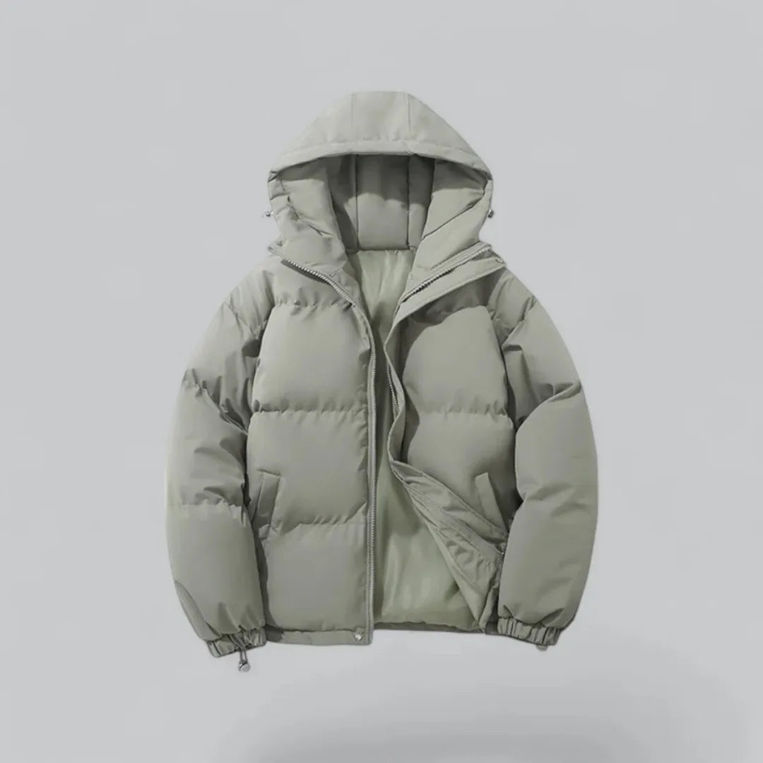 Sage green hooded puffer jacket, front zip fastened, showing box-quilted body and sleeves