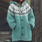 Teal green knit hooded cardigan with a cream and grey patterned yoke and button-up front