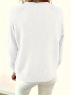 Side angle of a green knit jumper highlighting the soft brushed knit texture and button detail