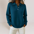 Teal knitted polo jumper with ribbed collar and buttoned neckline, long sleeves with ribbed cuffs