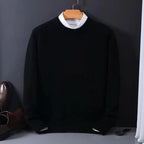 Black knitted jumper with contrast white collar, shown hanging with brown brogues and a mock shirt underneath