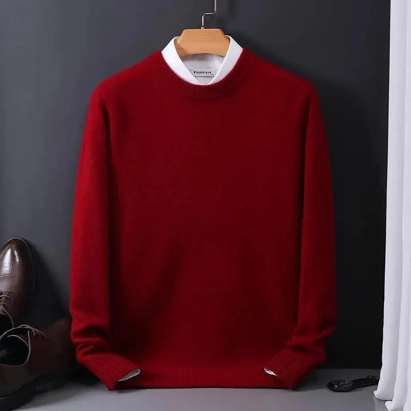 Deep red knitted jumper with white contrast collar and ribbed cuffs, displayed on a wooden hanger