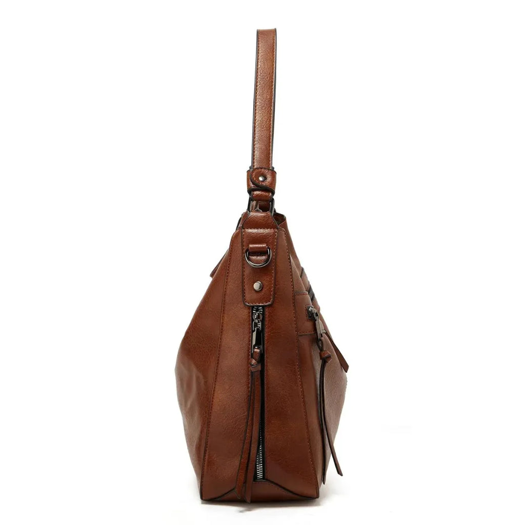 Back view of the brown hobo bag showing a single slim zip pocket on the smooth rear panel