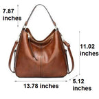 Flat base view of the brown hobo bag showing the leather-look texture and reinforced bottom seam
