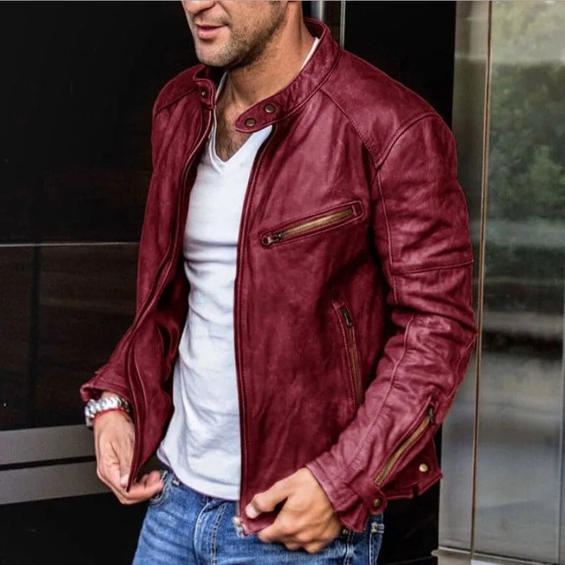 Burgundy leather-look jacket with stand collar and front zipper, side angle showing fitted sleeves and cuff fastening