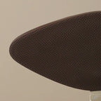Overhead angled shot of three ankle boots comparing black and brown leather tones