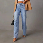 Close-up front view showing the high-waisted button fly and seam detailing on the light blue denim