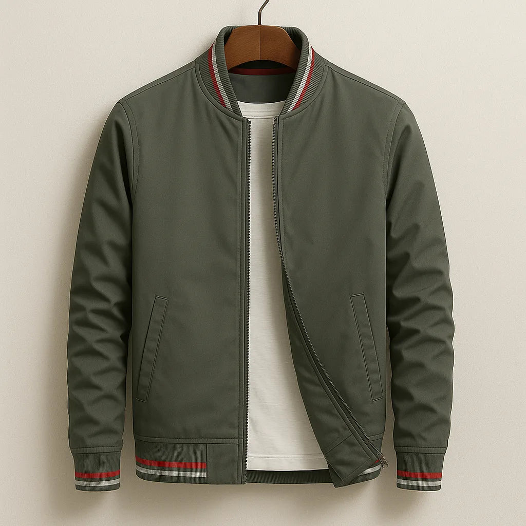 Olive green bomber jacket on a hanger with red, white and grey striped ribbing at collar and cuffs