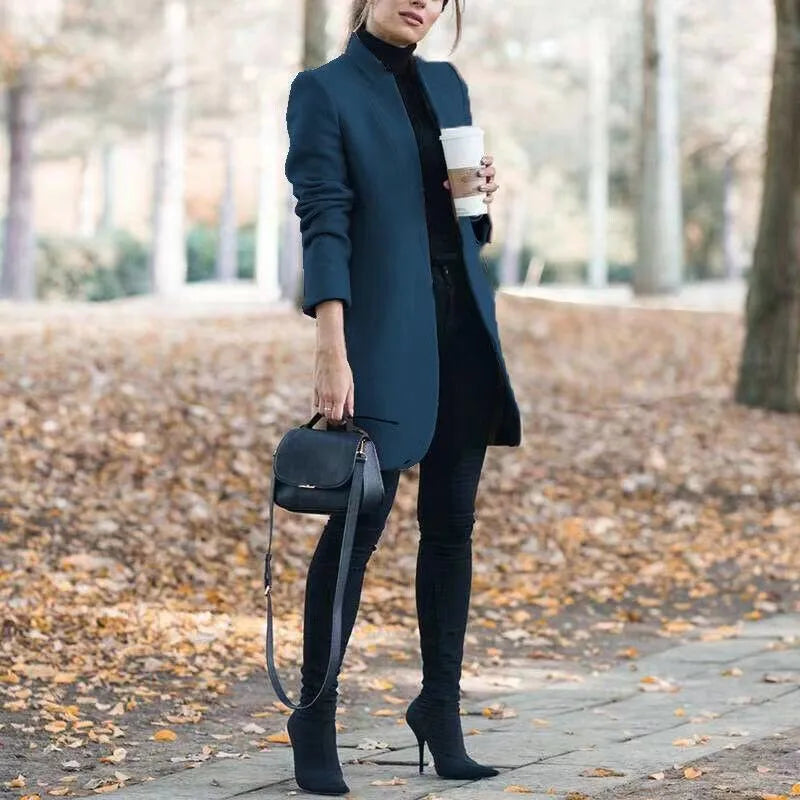 Teal blue longline tailored coat with concealed button front and structured shoulders