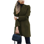 Close view of the stand collar and concealed button placket on the tailored longline coat