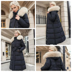 Close-up front view of the quilted brown puffer coat showing zip closure and snap button placket