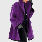 Purple shawl collar coat with black trim detail, shown open with set-in side pocket visible