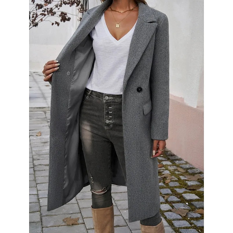 Dark grey tailored coat shown open to reveal the smooth interior lining and inner pocket