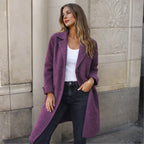 Purple wool longline coat with wide lapels and turned-back cuffs styled with a white top