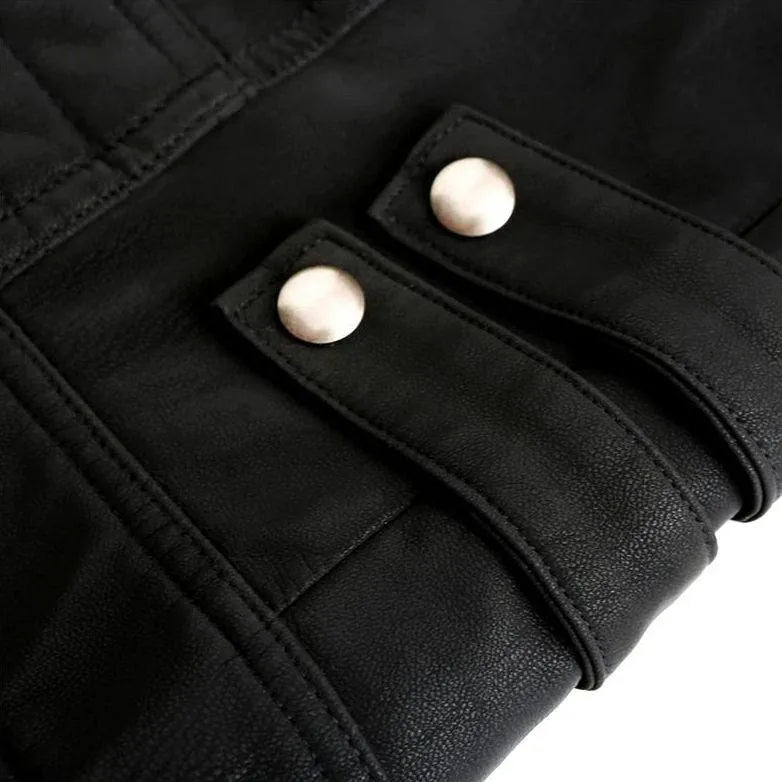 Detail shot of the twin press-stud tab fastenings on the jacket's waist panel