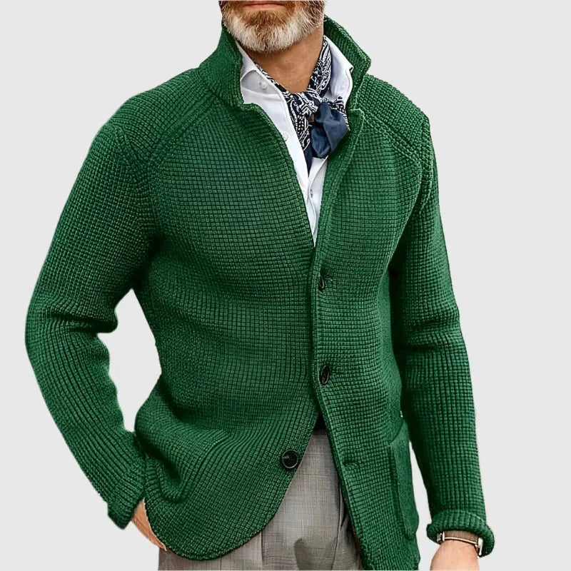 Side angle of the navy cardigan highlighting the ribbed knit texture across the sleeve