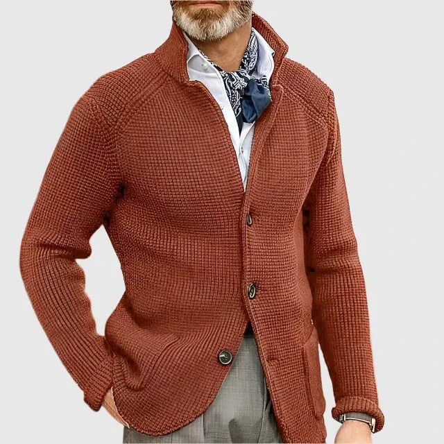 Detail shot of the button placket and knit texture on the beige cardigan