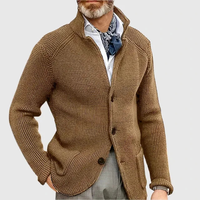 Full front view of the black knit cardigan showing the relaxed tailored silhouette