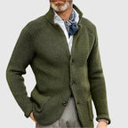 Olive green textured knit cardigan with stand collar and button placket, front view