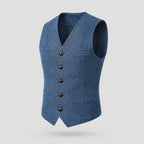 Side angle of a blue denim-effect waistcoat on a mannequin, showing the V-neck, buttons and chest pocket detail