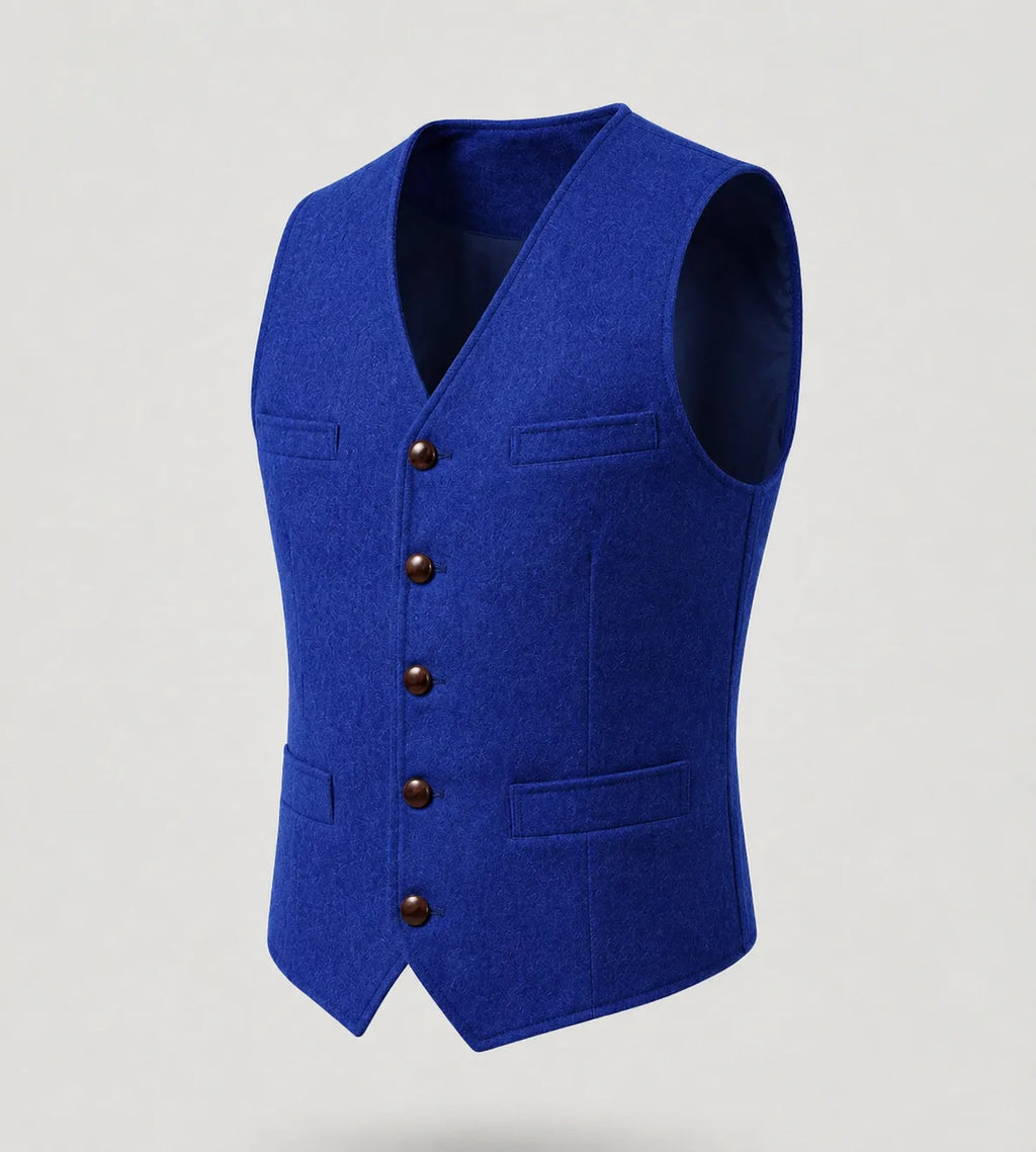 Royal blue wool-effect waistcoat on a mannequin, side angle showing the fitted silhouette and pocket flaps