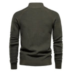 Back view of olive green knit cardigan showing textured raglan sleeves and ribbed stand collar
