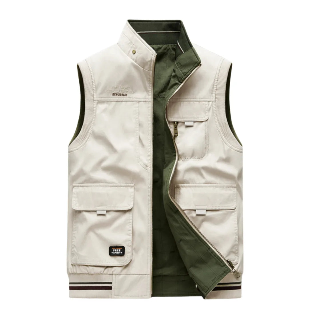 Beige cotton gilet with zip front open, showing olive green quilted lining, multiple patch pockets and stand collar