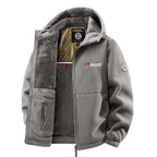 Grey fleece hooded jacket viewed at an angle, zip open to reveal honeycomb-pattern inner lining