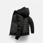 Flat lay side view of the black jacket showing the quilted body and contrast fleece sleeve