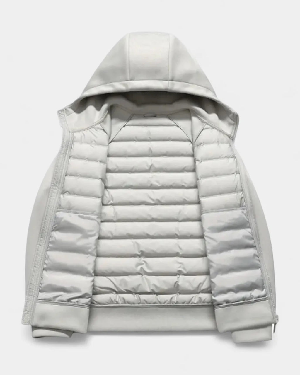 Interior view of the light grey jacket laid open, showing quilted lining and hood construction