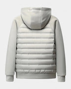 Back view of the light grey hooded jacket laid flat, showing quilted back panel and ribbed cuffs