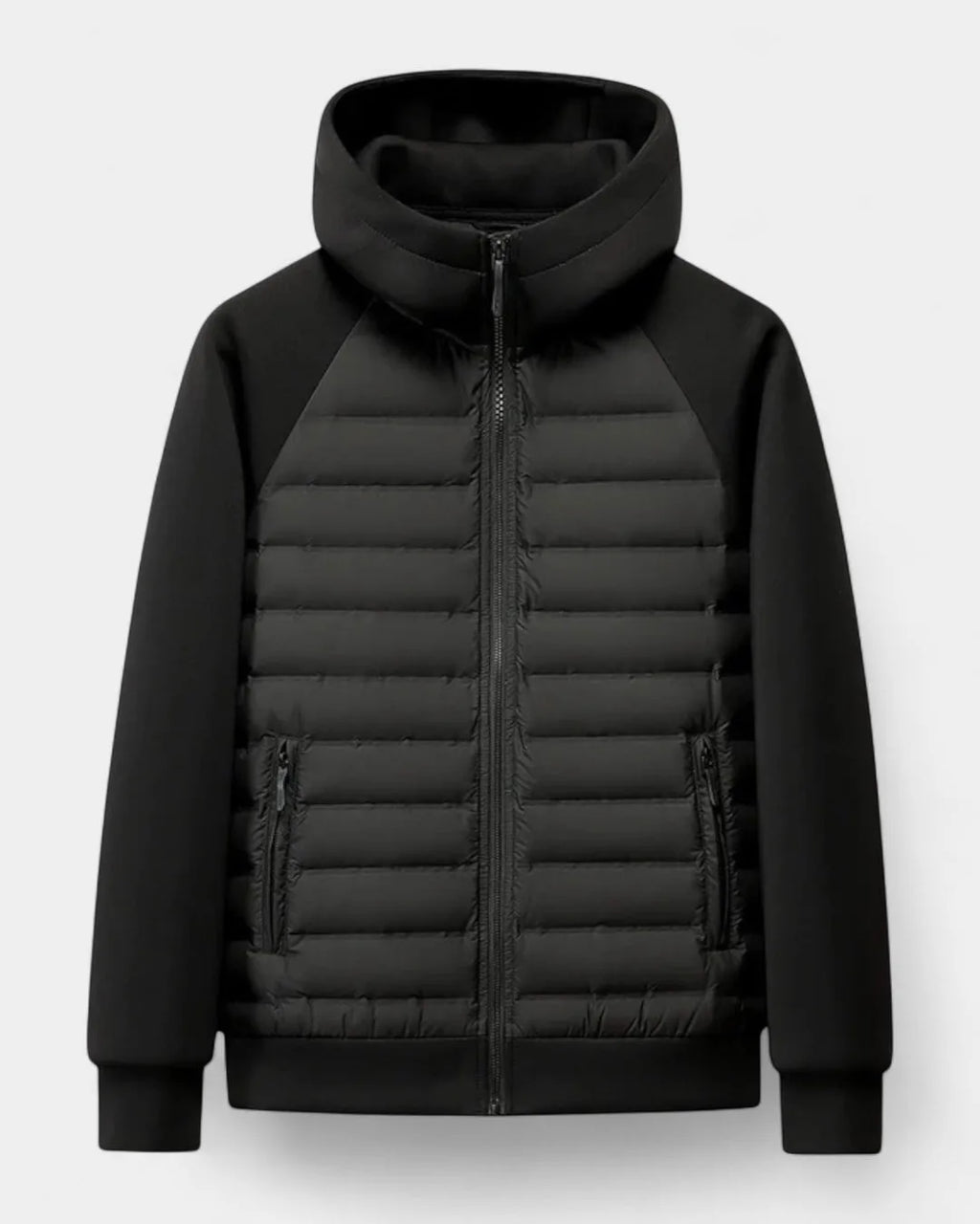 Front view of the jacket in black, laid flat, showing quilted panel, zip pockets and softshell sleeves