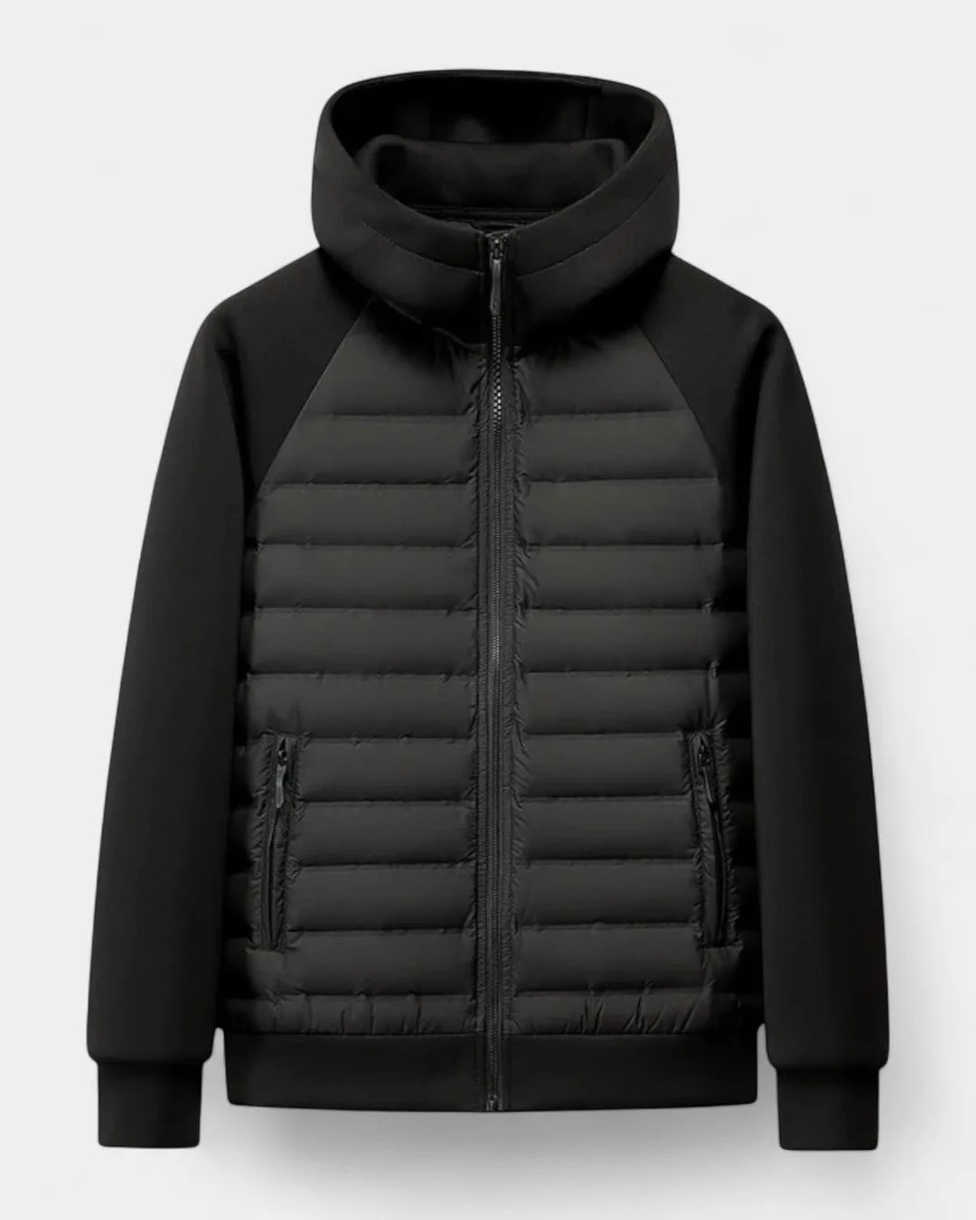 Front view of the jacket in black, laid flat, showing quilted panel, zip pockets and softshell sleeves