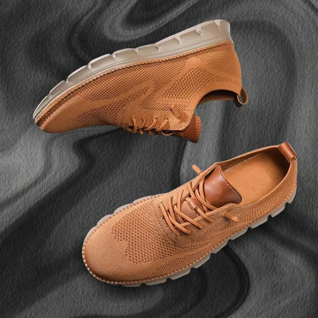 Tan knit trainer with matching tan leather heel tab and cream textured outsole