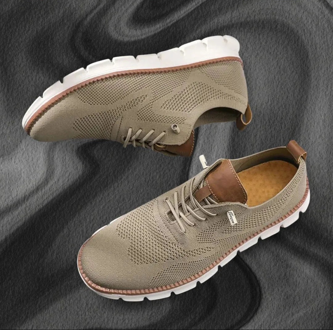 Khaki knit trainer with tan leather trim and white lugged sole photographed from above and the side