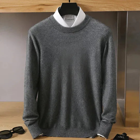 Grey knitted jumper with mock neck styled over a white shirt, hanging display, front view