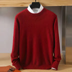 Red knitted jumper with mock neck shown over a crisp white shirt, hanging display
