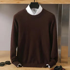 Dark brown knitted jumper with mock neck layered over a white shirt, front hanging view