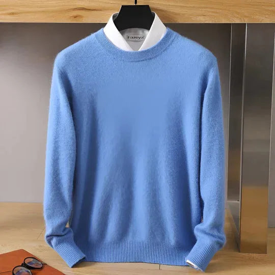 Sky blue knitted jumper with mock neck shown over a white shirt, front hanging view