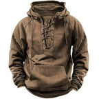 Close-up front view of the khaki hoodie highlighting the eyelet lacing and drawstring hood