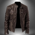 Brown leather biker jacket shown open, displaying smooth grain texture and stand collar with snap tab