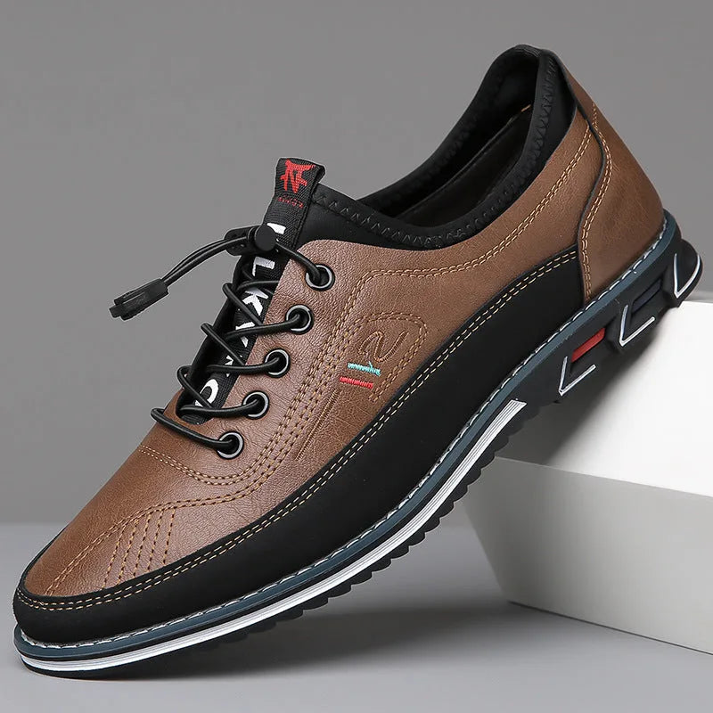 Three-quarter view of chestnut tan leather shoe showing stitched toe cap and elastic laces