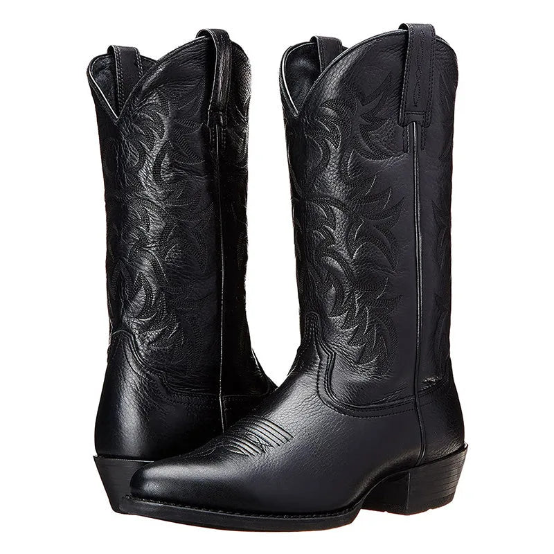 Front pair view of black leather cowboy boots with pointed toe and intricate stitched shaft detailing