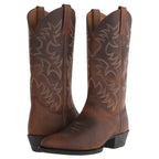 Close-up of the heel and sole unit on a brown leather cowboy boot showing tread detail